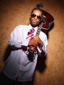 bangladesh producer Bangladesh holding a guitar